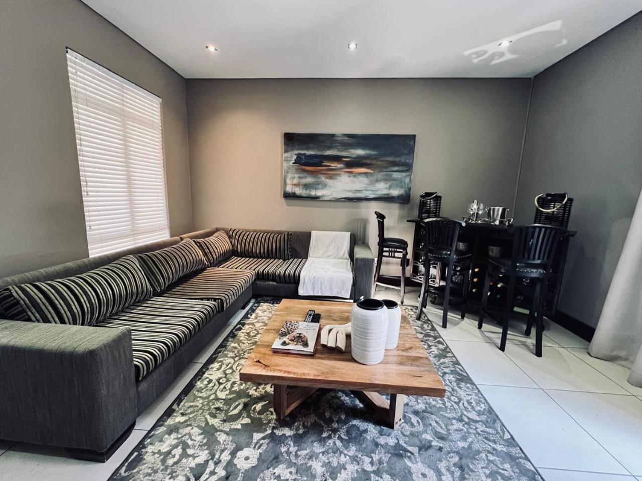 Tredenham Boutique Hotel Bloemfontein Exterior photo A living room in a house in South Africa